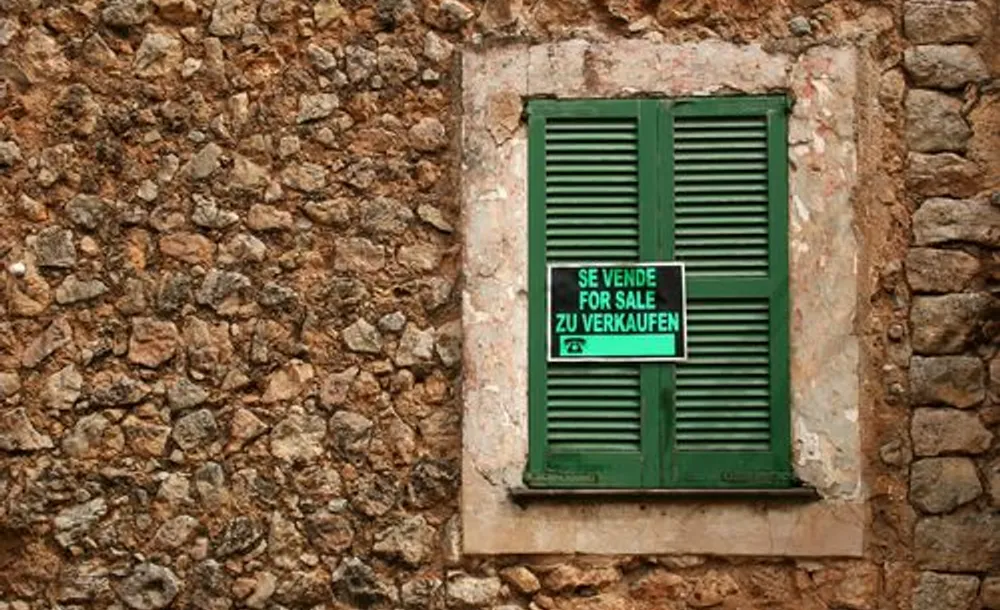 Spain for sale sign