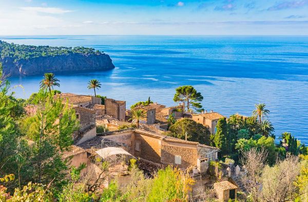 Idyllic view of mediterranean houses at the seaside of Deia, Majorca.jpg
